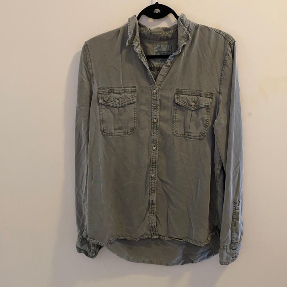 Army green chambray blouse with pocket detail.